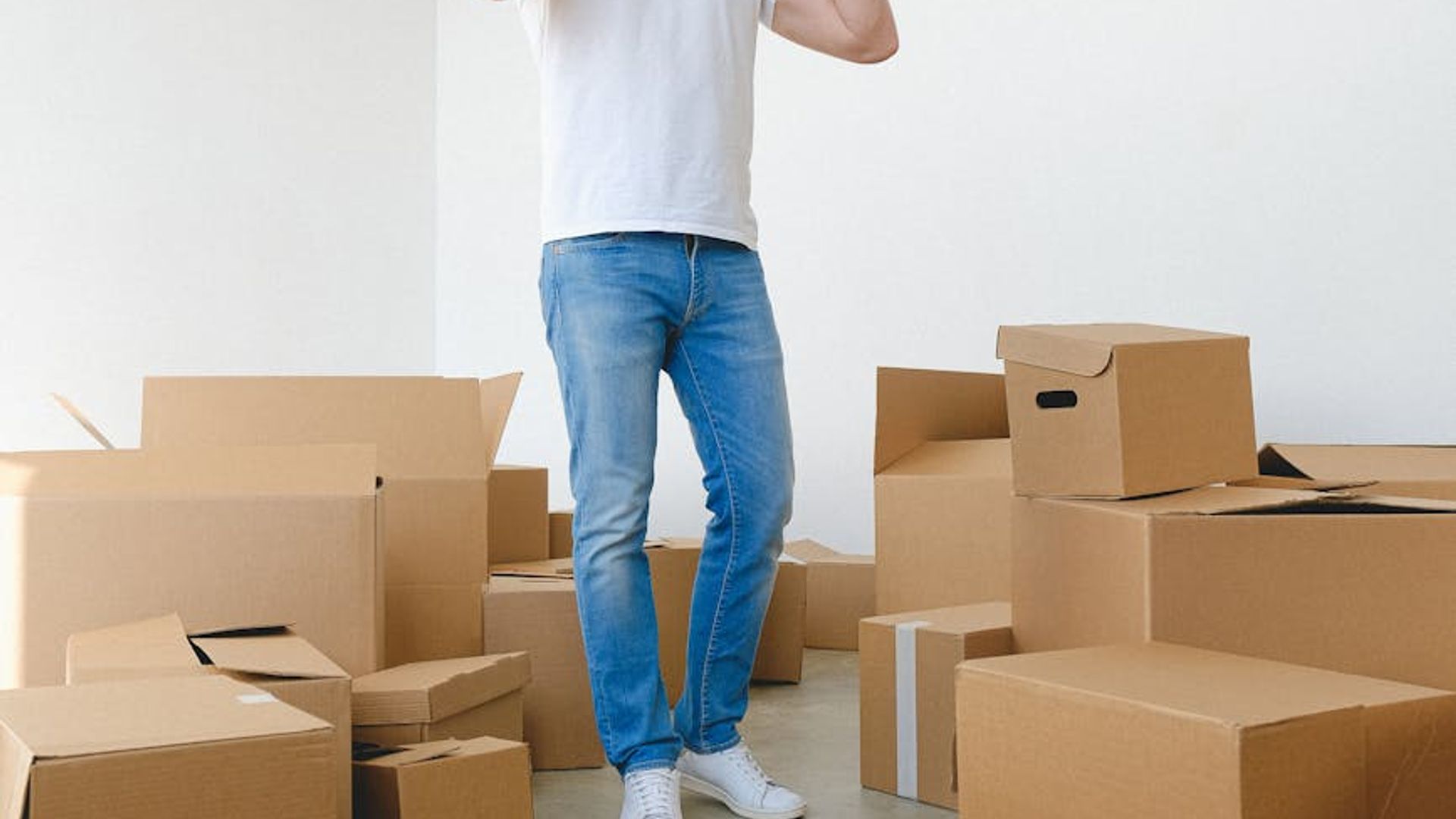 Active person moving in a modern training space with blue light.